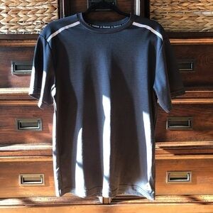 Reebok black moisture wicking short sleeve tee with reflectors in size S